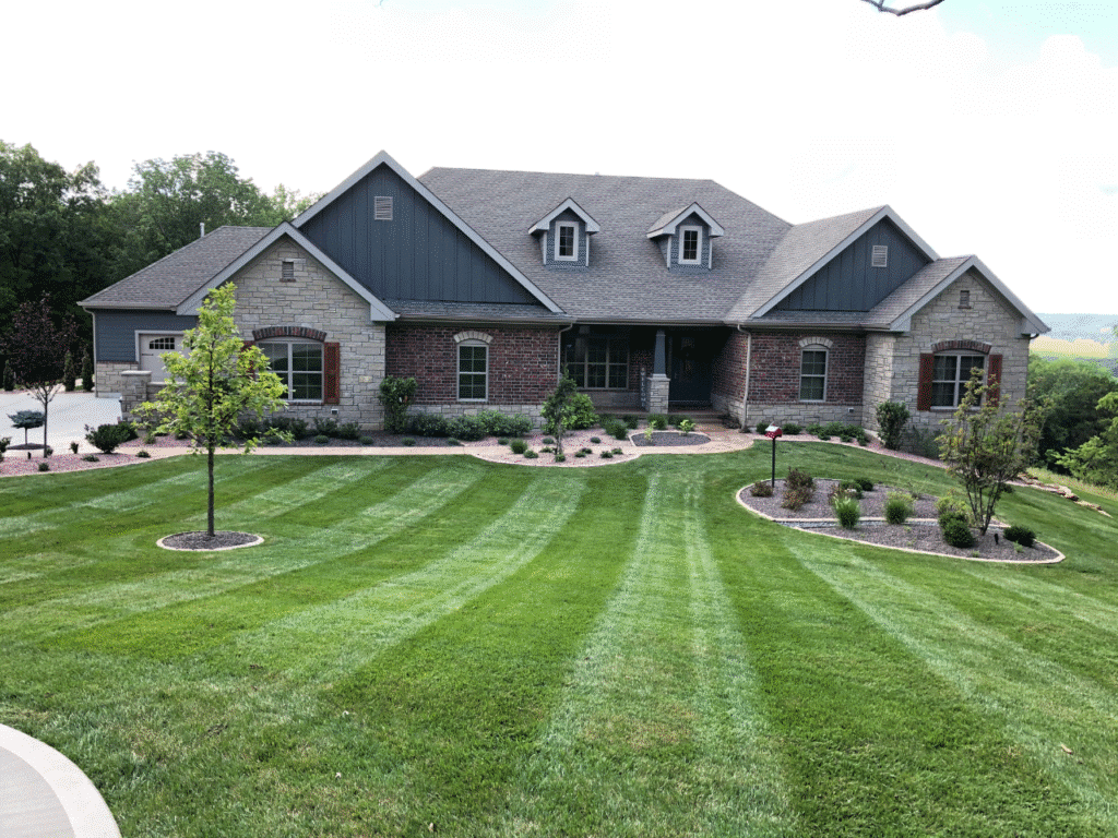 Front yard with new landscape and edging installed by Baxter Gardens in St. Louis
